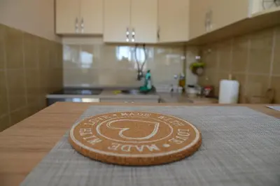 a cookie sitting on top of a kitchen counter at Studio Apartman Dunja in Jagodina