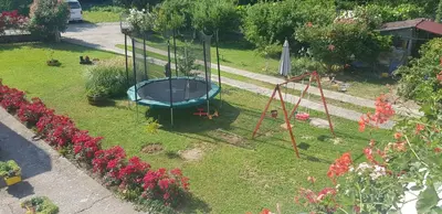 an aerial view of a playground in a garden at Apartmani Filipi in Vrnjačka Banja