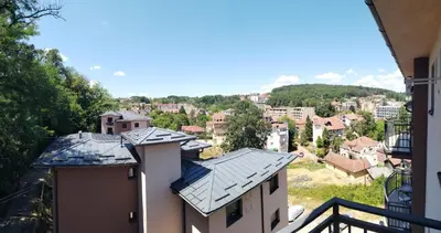 a view of a city from the balcony of a building at Apartman Ljubičica in Vrnjačka Banja