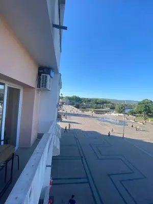 a view of the beach from a building at Bonanza Apartments in Niš