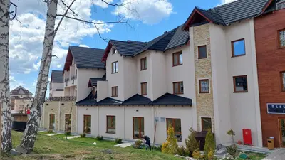 a row of houses with solar panels on them at Ctrl Alt Del Apartment S76 in Kopaonik