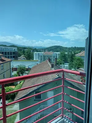 a view of a city from a balcony at Le Soleil Apartman Vrnjačka Banja in Vrnjačka Banja