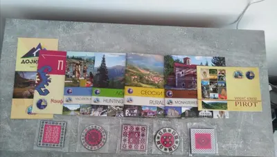 a collage of pictures of different places on a wall at Apartman MACA in Pirot