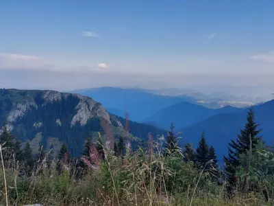 a view of the mountains from the top of a hill at Falling Star Apartman Brzece in Brzeće