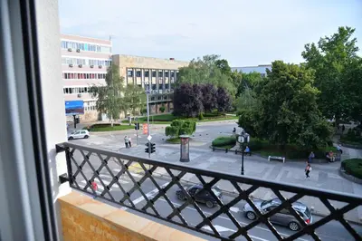 a view of a street from a balcony of a building at Bella Superior Apartment in Kruševac