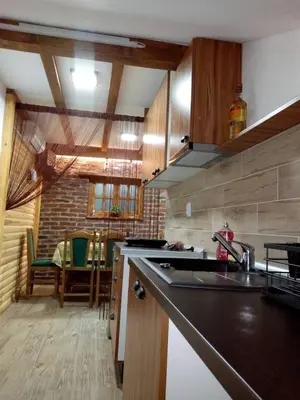 a kitchen with a sink and a counter top at Apartman Konak in Zaječar