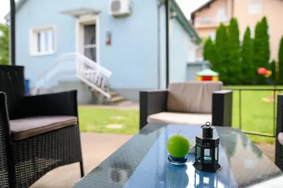 a glass table with a green ball on top of it at Arsic-Home in Soko Banja