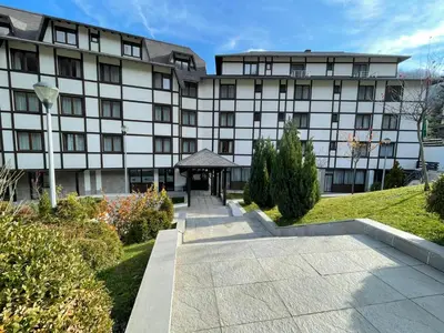 a building with a pathway in front of it at Mountain Story in Brzeće