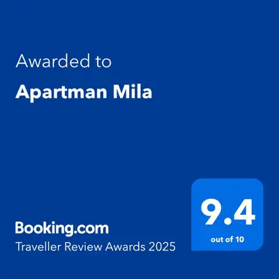 a blue text box with the words awarded to armenian milka at Apartman Mila in Niš