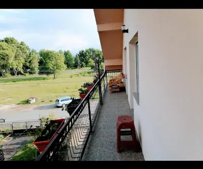 a balcony of a building with a view of a parking lot at Privatni smestaj - Grujic in Bujanovac
