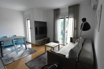 a living room with a couch and a table at Apartman Lipa 11 in Vrnjačka Banja