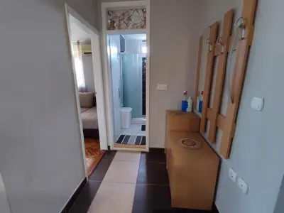 a bathroom with a shower and a sink and a mirror at MilijicLux in Soko Banja