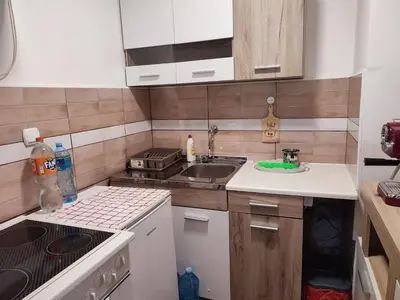a small kitchen with a sink and a stove at MilijicLux in Soko Banja