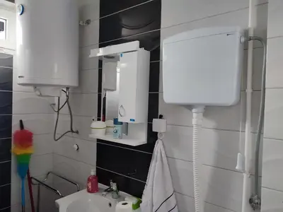 a bathroom with a sink and a mirror at MilijicLux in Soko Banja