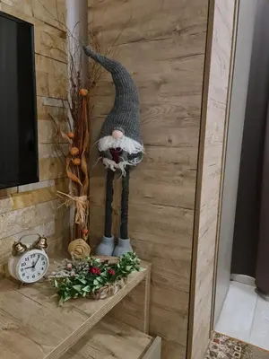a statue of a peacock sitting on a table at Apartman Sky Milmari L20 in Kopaonik