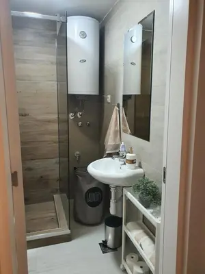 a bathroom with a sink and a shower at Verona 25 in Vrnjačka Banja