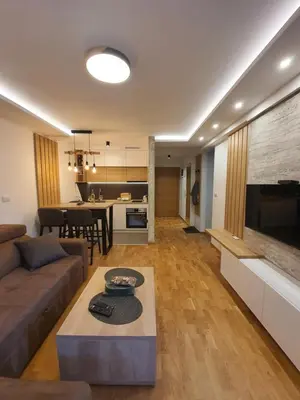 a living room with a couch and a table at Verona 25 in Vrnjačka Banja