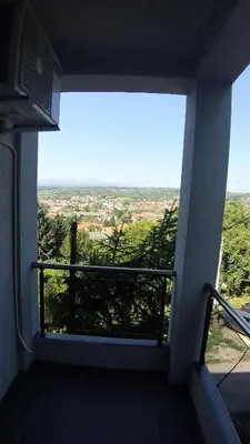 a room with a balcony with a view at Studio 