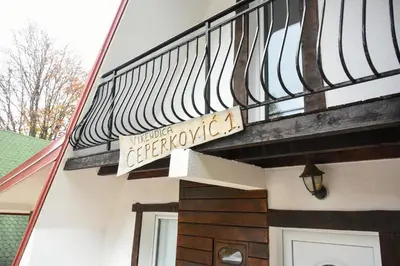 a sign on the side of a house at Vikendica Čeperković #1 in Kopaonik
