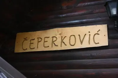 a sign on the side of a wall with the word everyone at Vikendica Čeperković #2 in Kopaonik