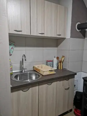 a kitchen with a sink and a counter top at Vikendica Čeperković #2 in Kopaonik