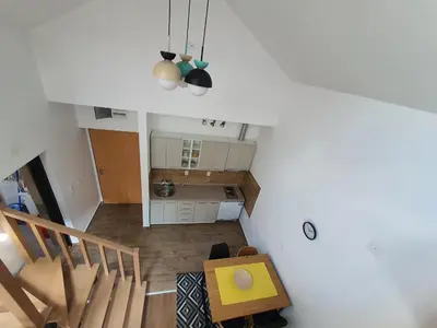 an overhead view of a kitchen and stairs in a house at Apartman Buena Vista in Soko Banja