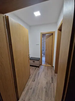 an empty hallway with two doors and a room at Nina Apartman 2 in Soko Banja