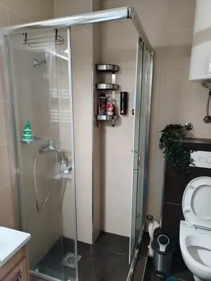 a shower stall in a bathroom with a toilet at Kopaonik Župa 505 in Kopaonik