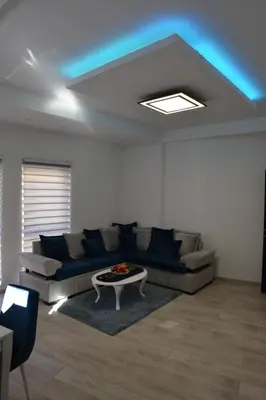 a living room with a couch and a table at Stan na dan Raška in Raška