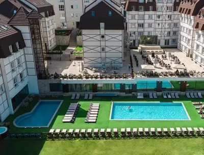 an aerial view of a pool in a building at KATARINA - Lux two bedroom apartment in ski resort Kopaonik in Kopaonik