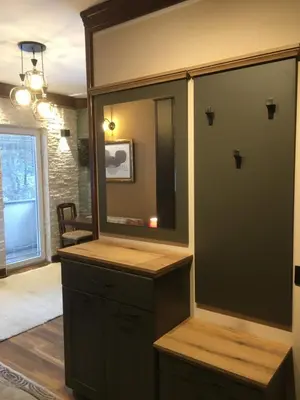 a bathroom with a large mirror and a dresser at Lux Apartman Holiday-Brzeće, Kopaonik in Brzeće