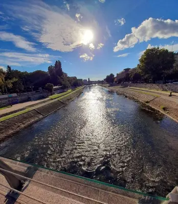 a view of a river from a bridge at Limone apartmani Niš in Niš
