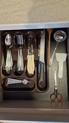 a tray filled with utensils in a drawer at Kopaonik Bliss in Kopaonik