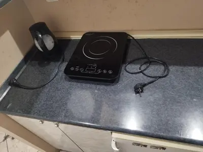 a black router sitting on top of a counter at Salvatori in Garić