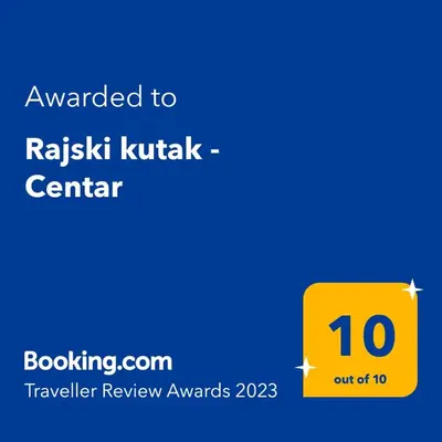 a yellow sign with the text awarded to rishi kaughak center at Rajski kutak - Centar in Kopaonik