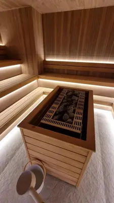 a small sauna with a woodenvisor with a wooden at Woodside Kopaonik by Ister in Kopaonik