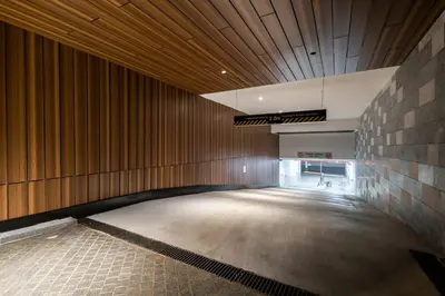 a large empty room with a brick wall at Woodside Residence 325 in Kopaonik
