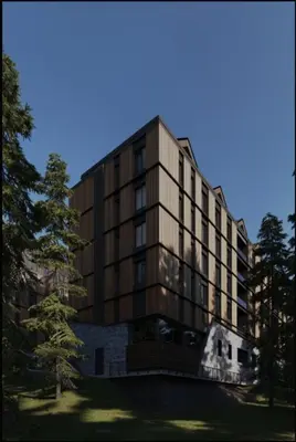 a building with a tree in front of it at Woodside apartments Kopaonik with garage in Kopaonik