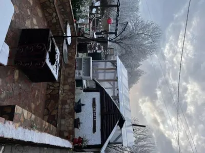 an overhead view of a building with snow on it at Vila Milica Poganovo in Poganovo