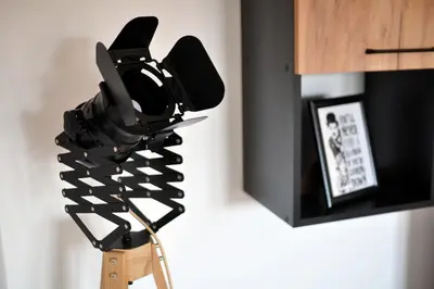 a camera on a tripod next to a wall at Apartman Chaplin in Vrnjačka Banja