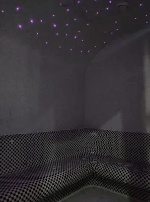 a room with a ceiling with purple stars on it at Apartman N98 Milmari Kopaonik in Kopaonik