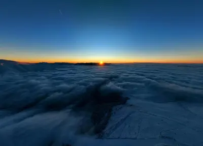 a view of the sunset from above the clouds at Stefanović - Studio 1 in Inovo