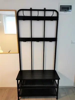 a black shelf in a room at Kod Dede Brzece in Brzeće