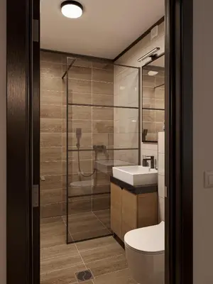 a bathroom with a toilet and a sink and a shower at Xenon Apartments in Kopaonik