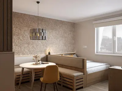 a small dining room with a table and a bench at Xenon Apartments in Kopaonik