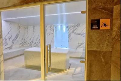 a glass door with a vase inside of it at Woodside Kopaonik 416 in Kopaonik