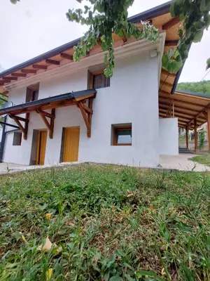 a house with a large yard in front of it at Udahni prirodu in Raška