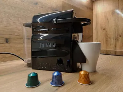 a coffee maker sitting on top of a table at LUX Apartment STEVANOVIC A86 in Kopaonik