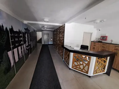 a hallway with a desk in a room at Twin mountain in Kopaonik