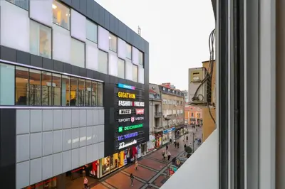 a view of a city street from a window at Heart of Niš in Niš